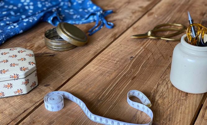 Dressmaking table with tools
